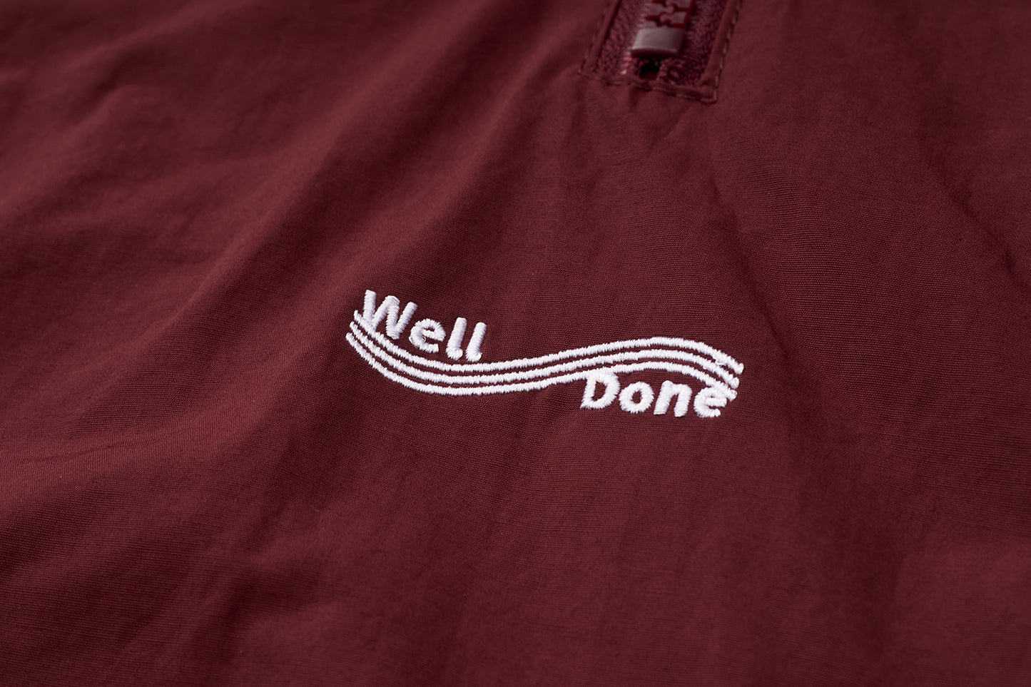 Mizuno Sportstyle and WELL DONE Present “OLD FORM, NEW FEEL”  Half-Zip Windbreaker — Burgundy