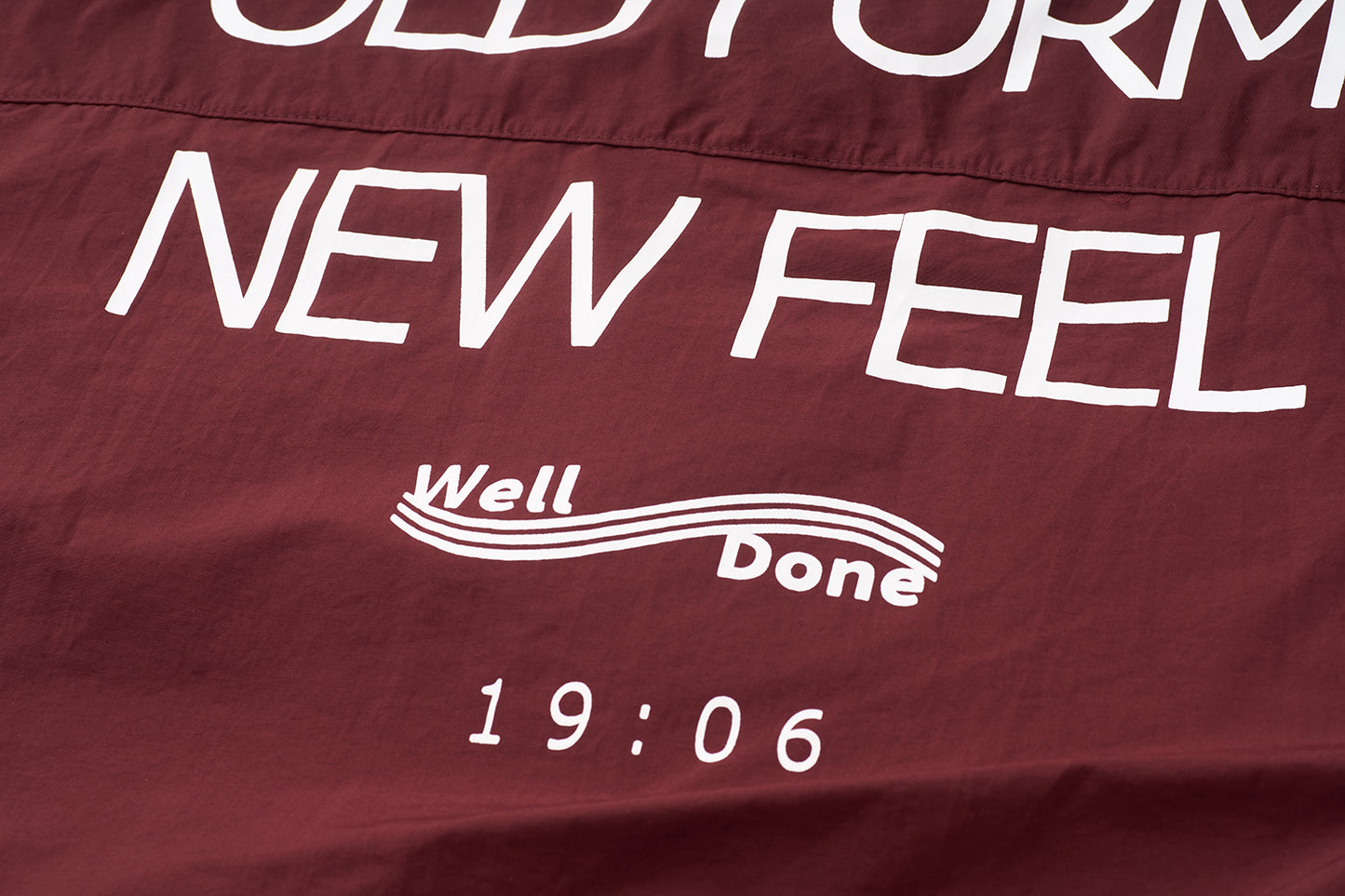 Mizuno Sportstyle and WELL DONE Present “OLD FORM, NEW FEEL”  Half-Zip Windbreaker — Burgundy