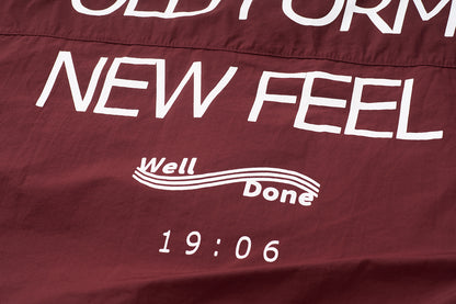 Mizuno Sportstyle and WELL DONE Present “OLD FORM, NEW FEEL”  Half-Zip Windbreaker — Burgundy
